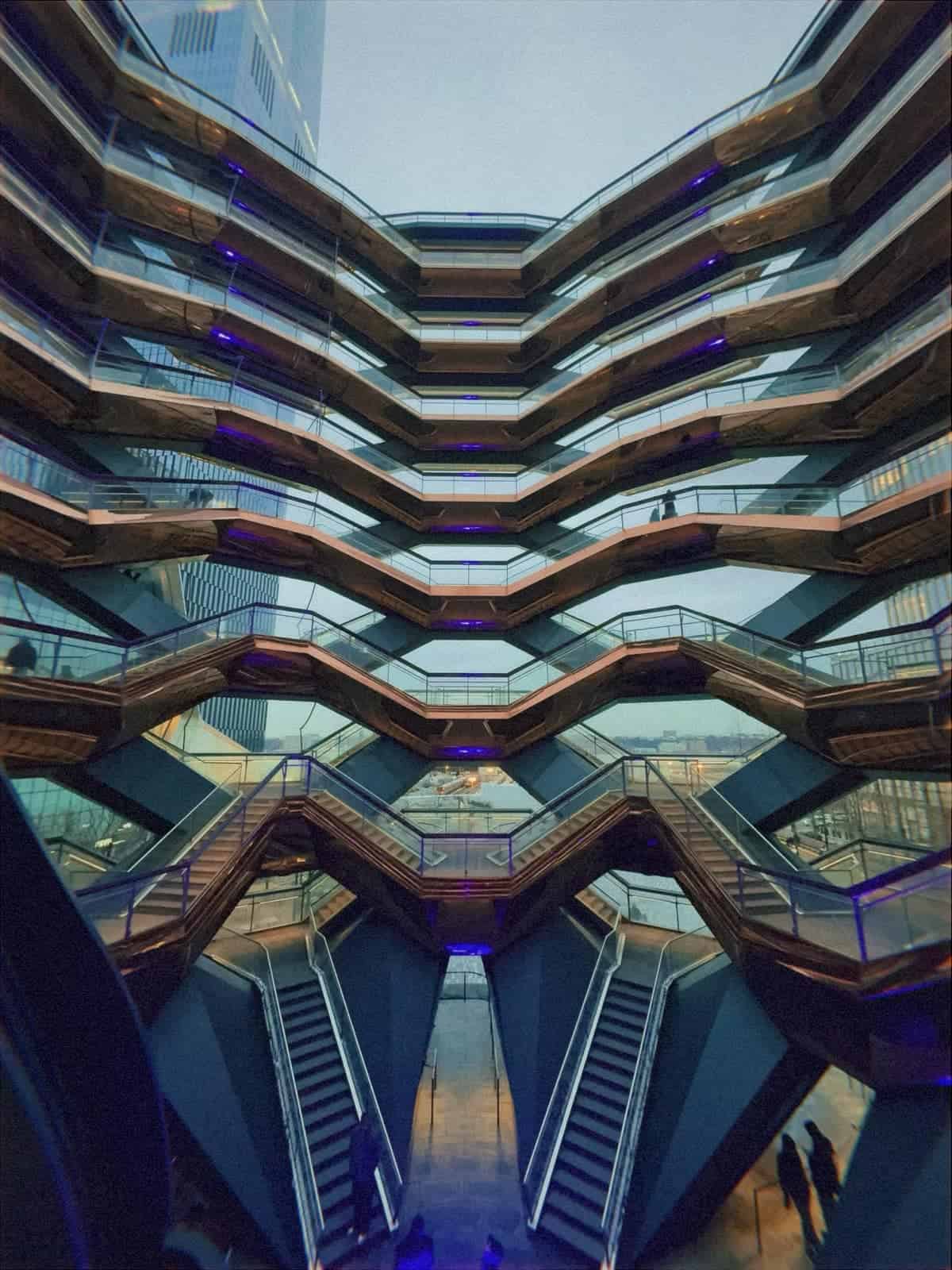 Symmetrical copper-colored staircases inside the Vessel