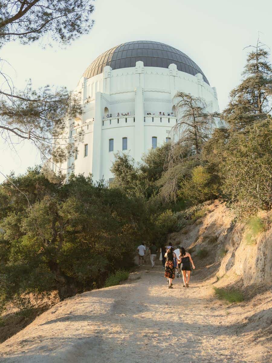 A path leading toward Griffith Observatory through trees