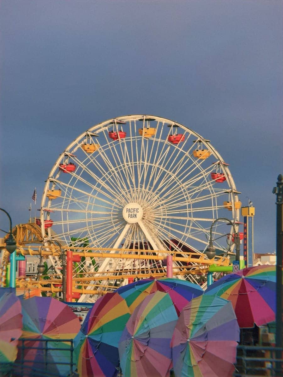 Santa Monica Pier Ferris wheel lit up at dusk