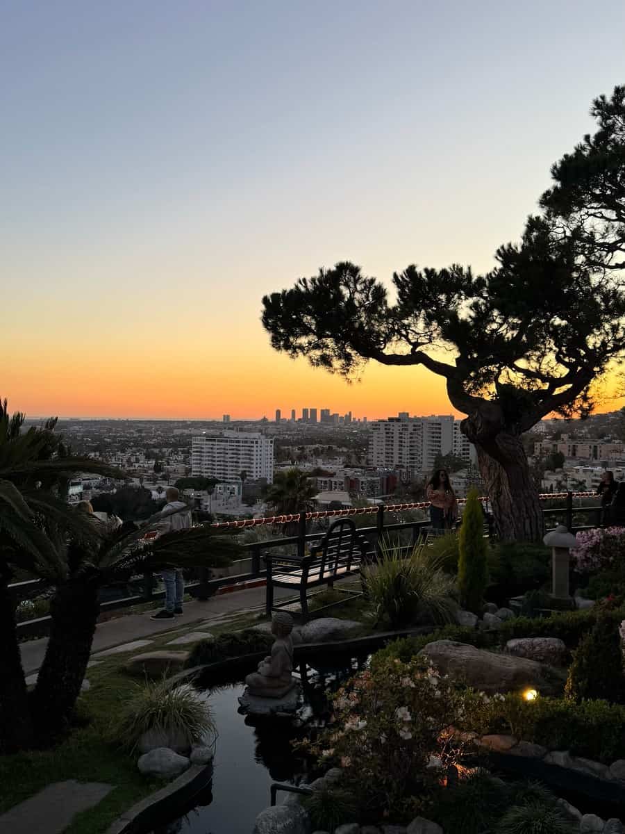 Garden and city skyline at sunset from Yamashiro Hollywood