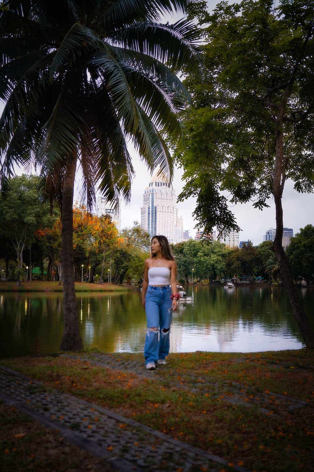 Grace walking in Lumphini Park, Bangkok