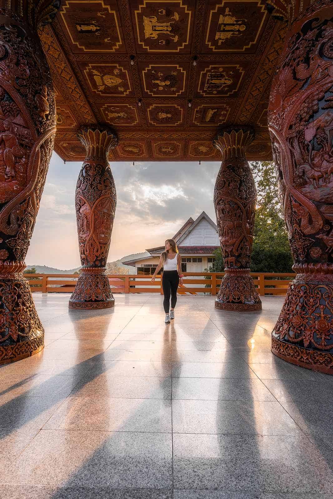 Carved pillars framing the terrace at Doi Suthep