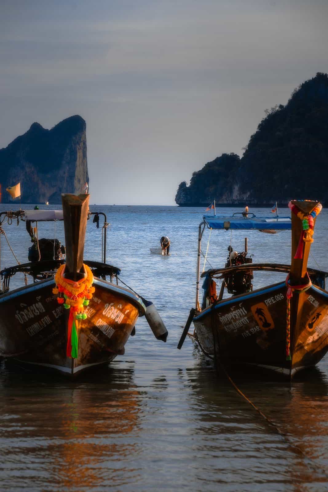 Longtail boats at sunset in the Phi Phi Islands